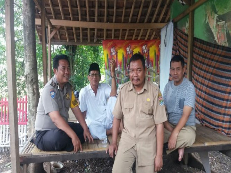 IMG-disela-kesibukan-bhabinkamtibmas-sambang-warga-ciptakan-situasi-kondusif