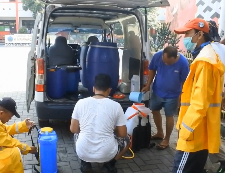 IMG-gotong-royong-basmi-covid-19-di-sekolah