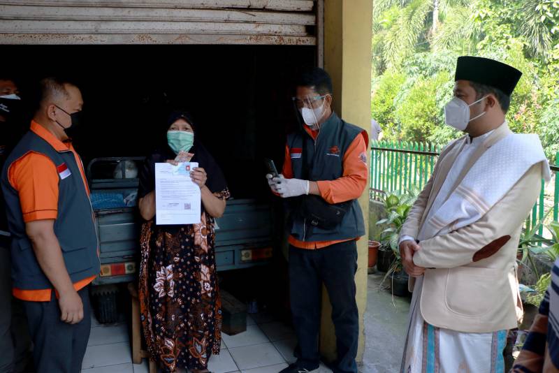 IMG-pemkot-tangerang-bersama-pt-pos-indonesia-distribusikan-bst-ke-444-kpm
