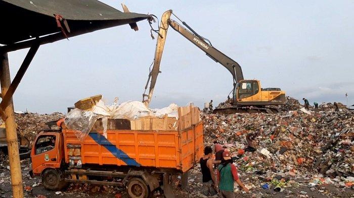 IMG-pengangkutan-sampah-di-tpa-rawa-kucing-kota-tangerang-berjalan-normal