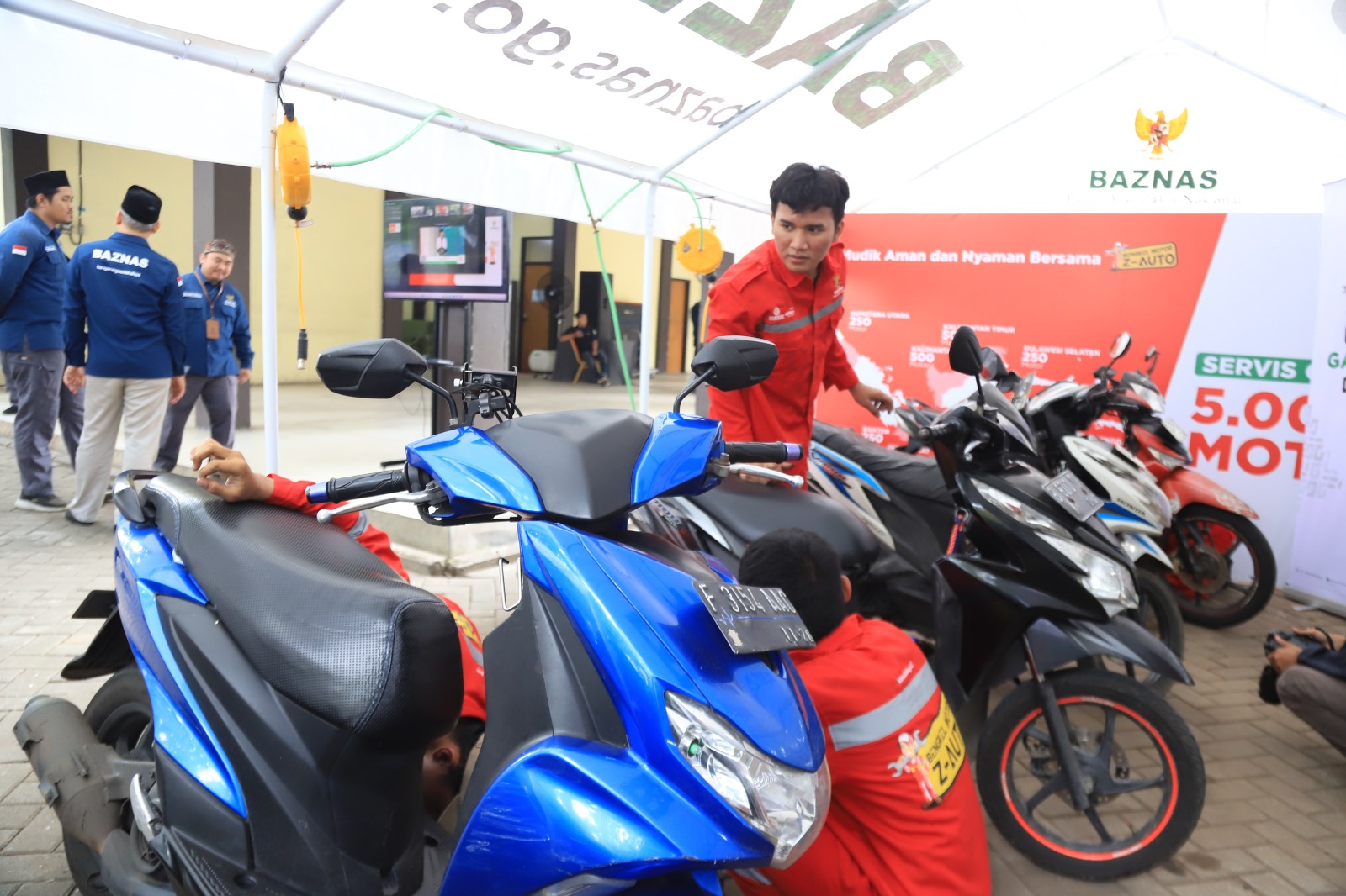 IMG-warga-berbondong-bondong-manfaatkan-servis-dan-ganti-oli-gratis-baznas-kota-tangerang
